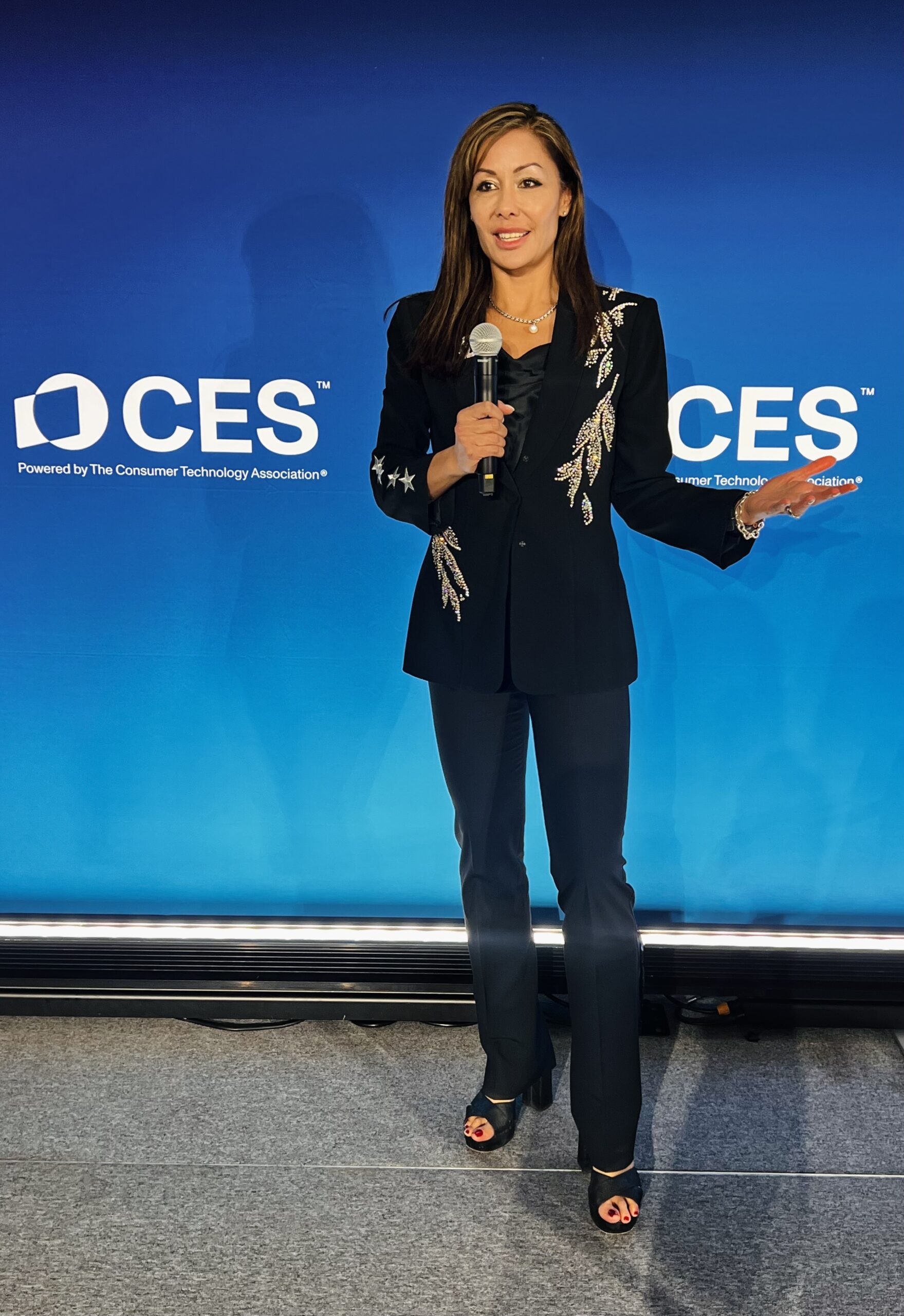 Susan Sly, founder and CEO of The Pause Technologies, speaking on stage at CES 2025